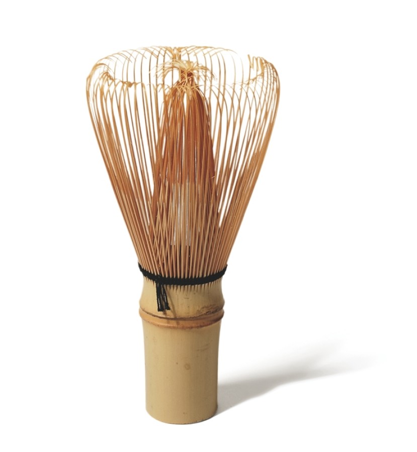 This tea whisk is less than five inches long. It was made from a single piece of bamboo that was split with a knife into inner and outer tines.