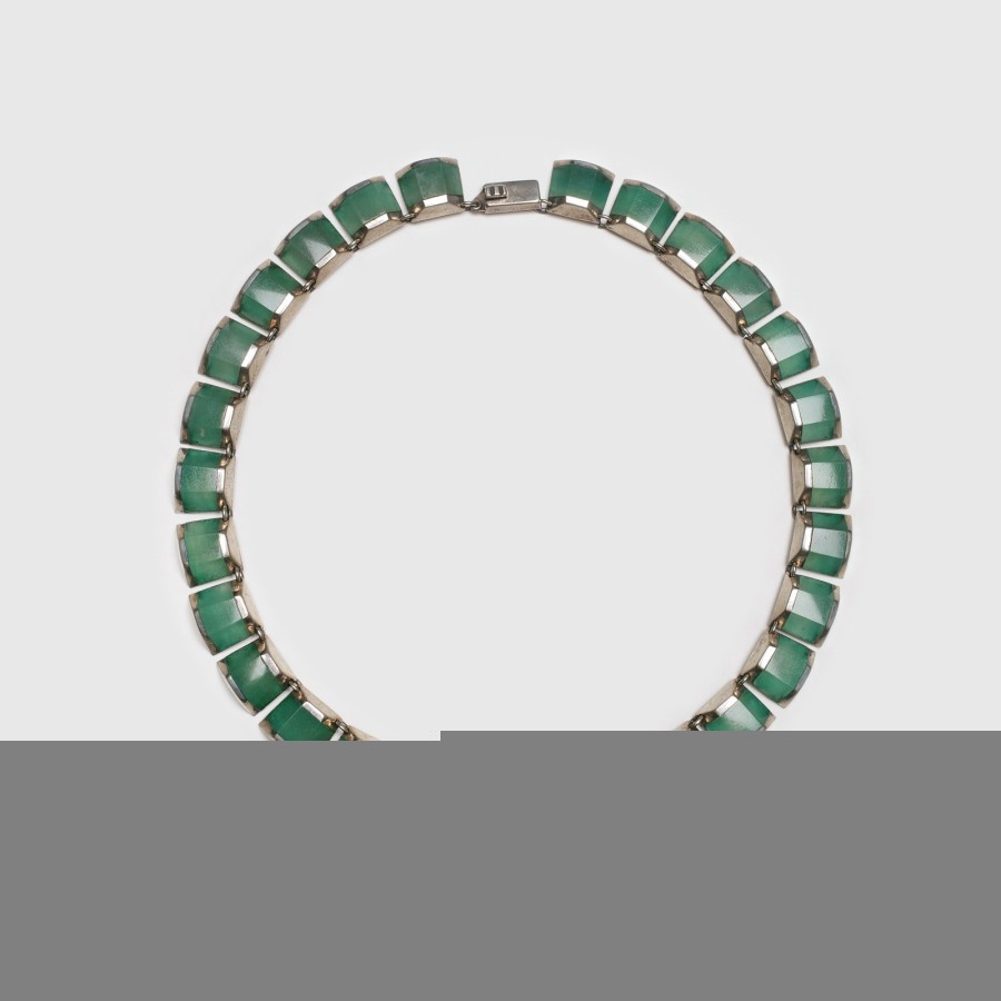 This necklace is made of small rectangular jelly jade stones set in silver.