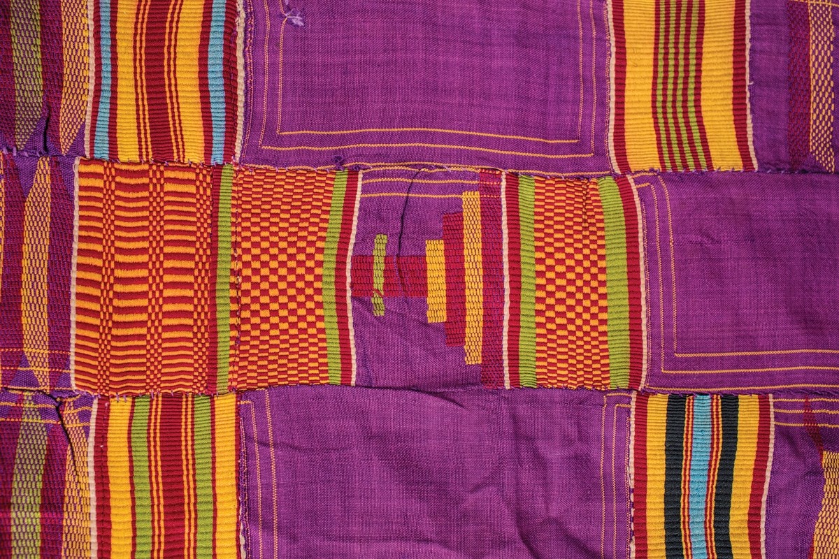 Shoulder’s Cloth (Kente), Ghana, Asante, early 20th century, silk (weft-face plain weave, supplementary weft, hand-sewn). Gift of Barb Rich. Photo by Katie Gardner.